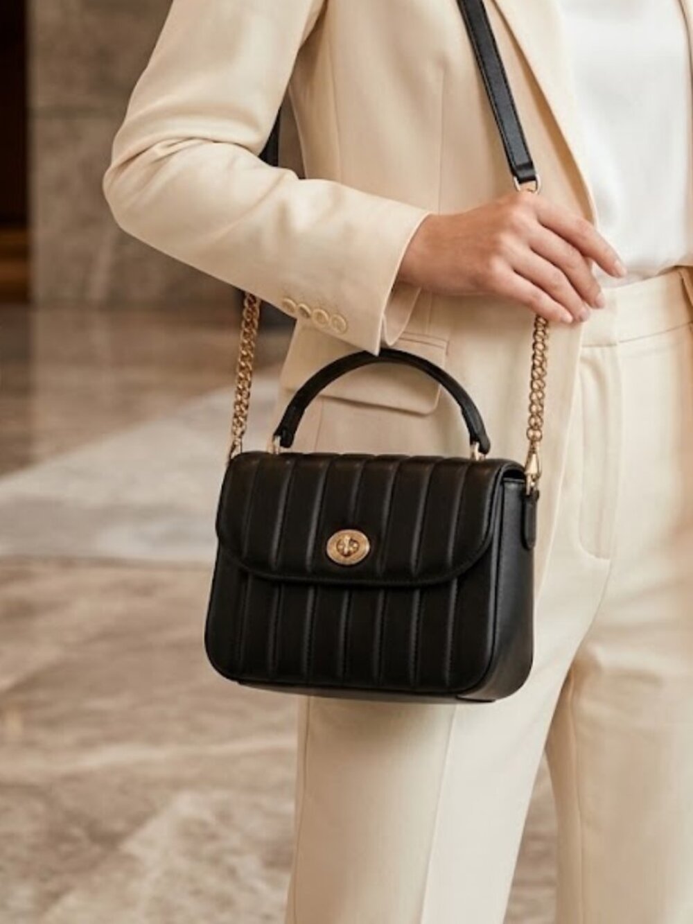 Coach Black Quilted Top-Handle Satchel with Gold Hardware